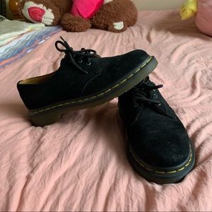 Black suede Dr. Martens. Low top